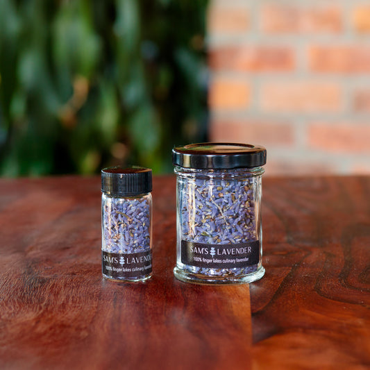 Glass jar and mini vial of Sam's culinary lavender buds