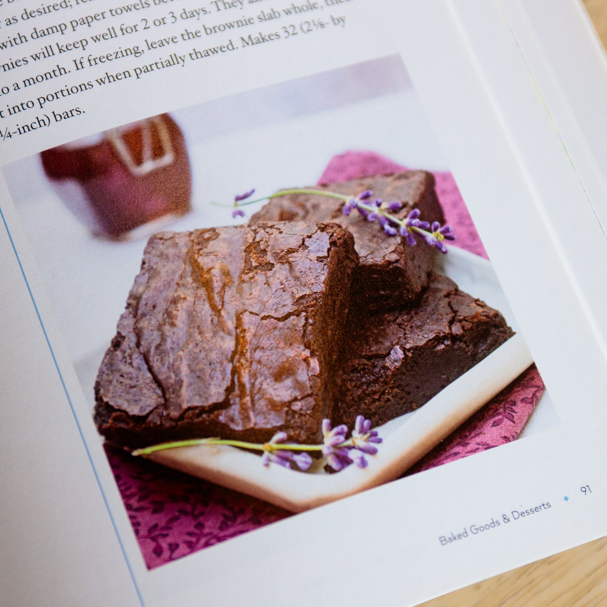 Open page of 'The Art of Cooking with Lavender' by Nancy Baggett featuring chocolate lavender brownies