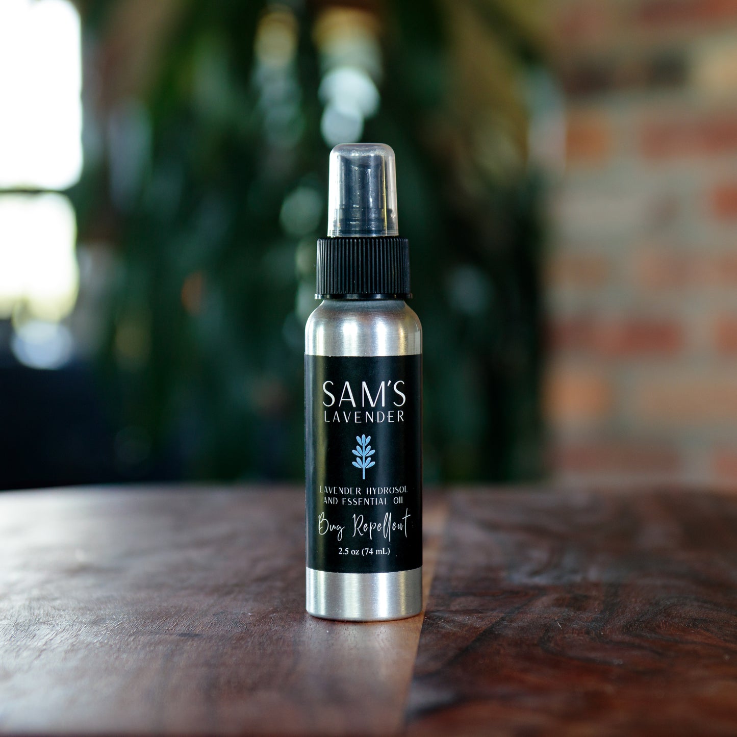 aluminum bottle of sam's lavender hydrosol and essential oil bug repellent