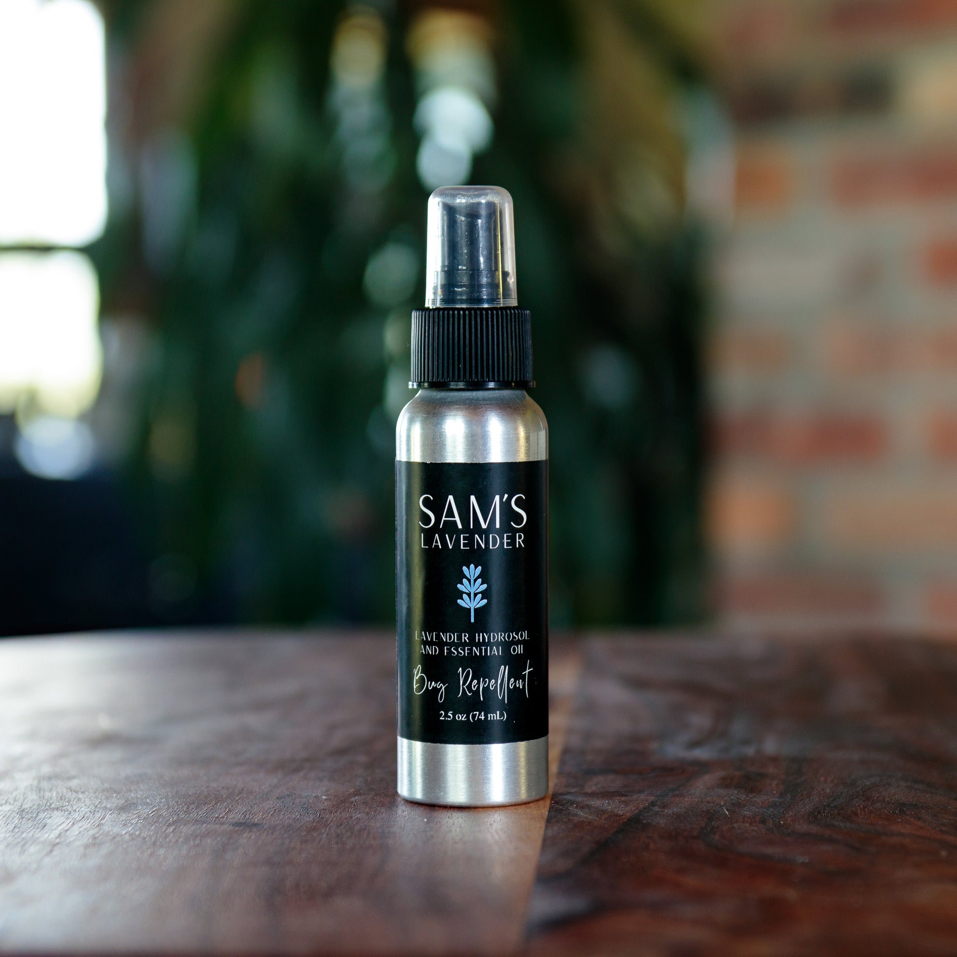 aluminum bottle of sam's lavender hydrosol and essential oil bug repellent