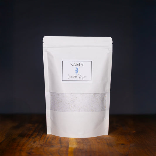 White resealable paper pouch labeled "Sam's Lavender Sugar" containing 8-16 oz of lavender sugar.
