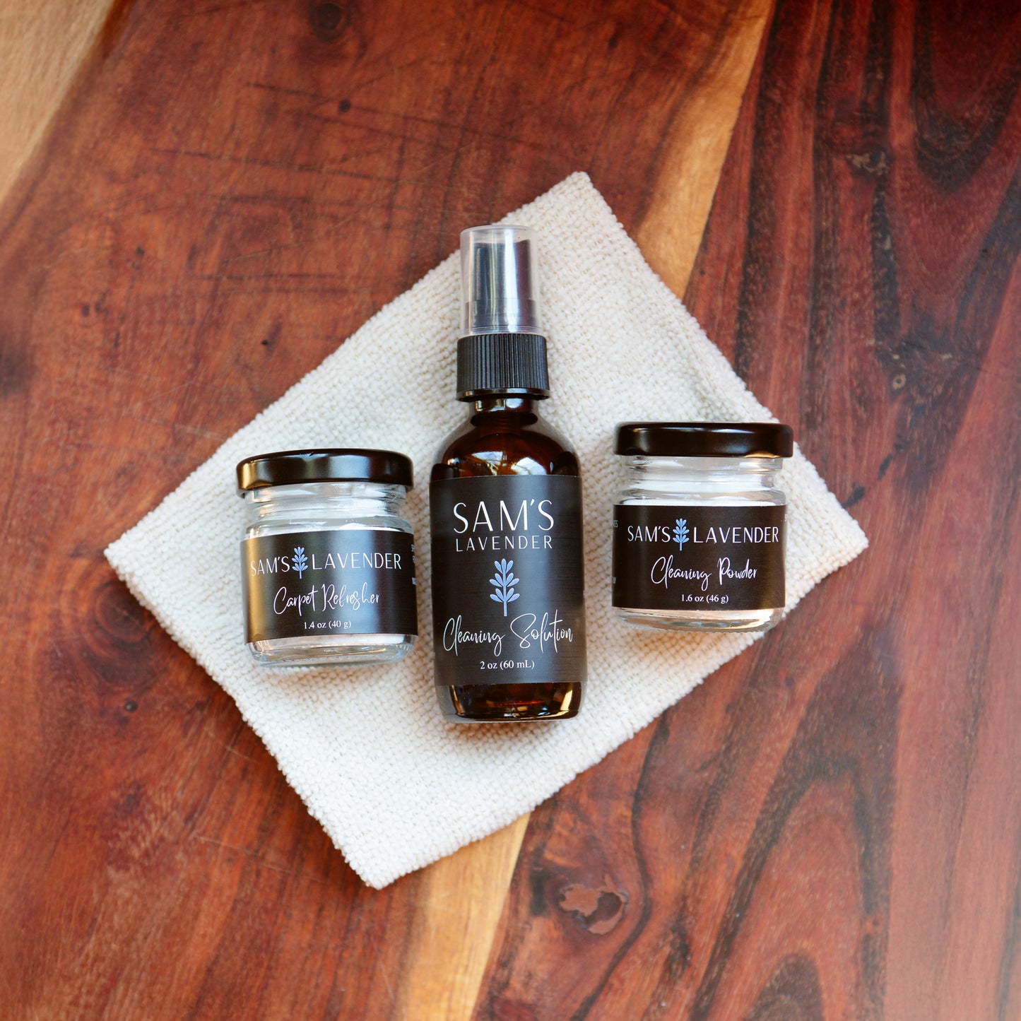 Sam's mini cleaning set with carpet refresher, cleaning powder, cleaning solution, and microfiber cloth